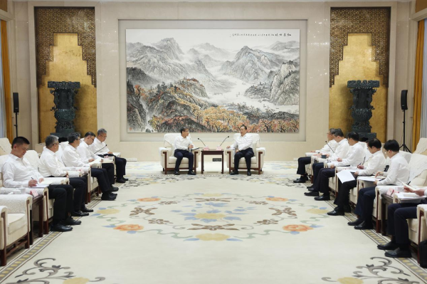 周治平与湖北省委书记王忠林举行会谈